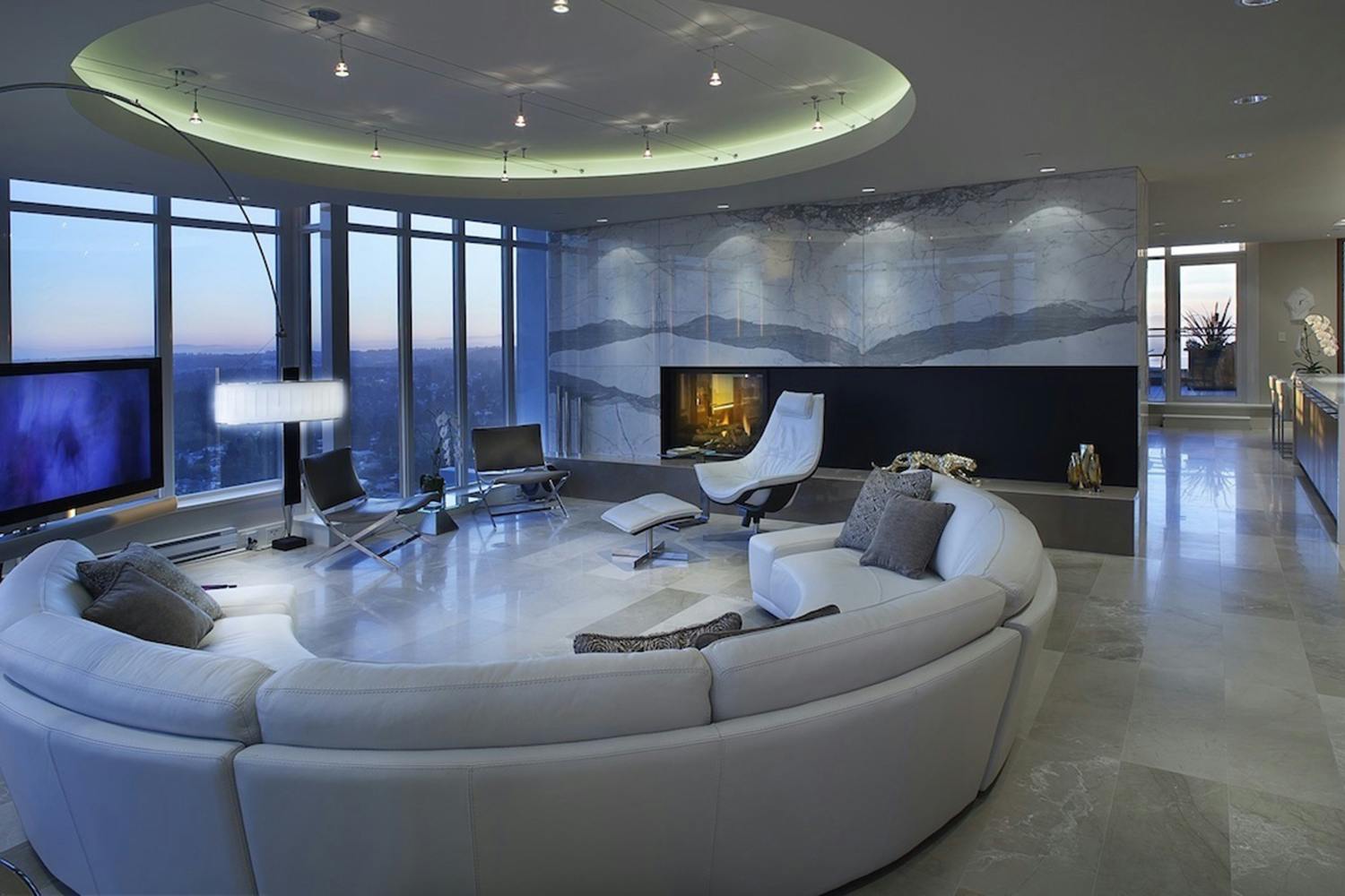Penthouse Residence Surrey living room and fireplace at night